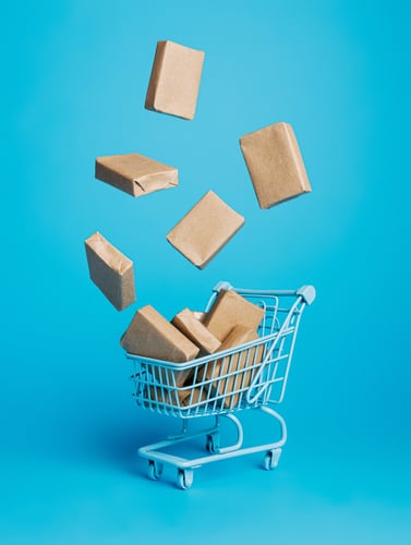 A shopping cart with boxes 