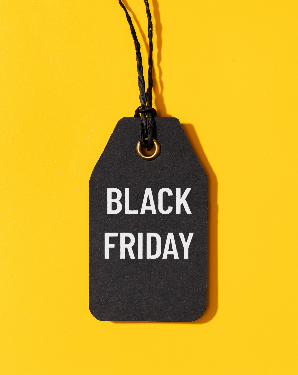 a Black Friday tag on yellow background