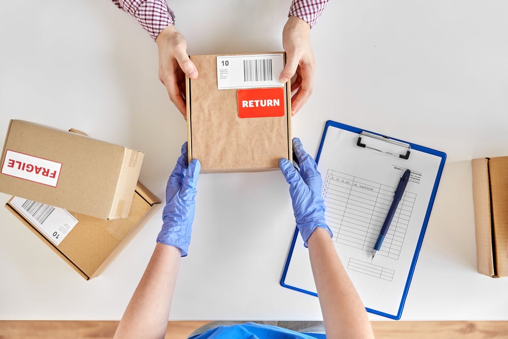 return package getting handed to worker