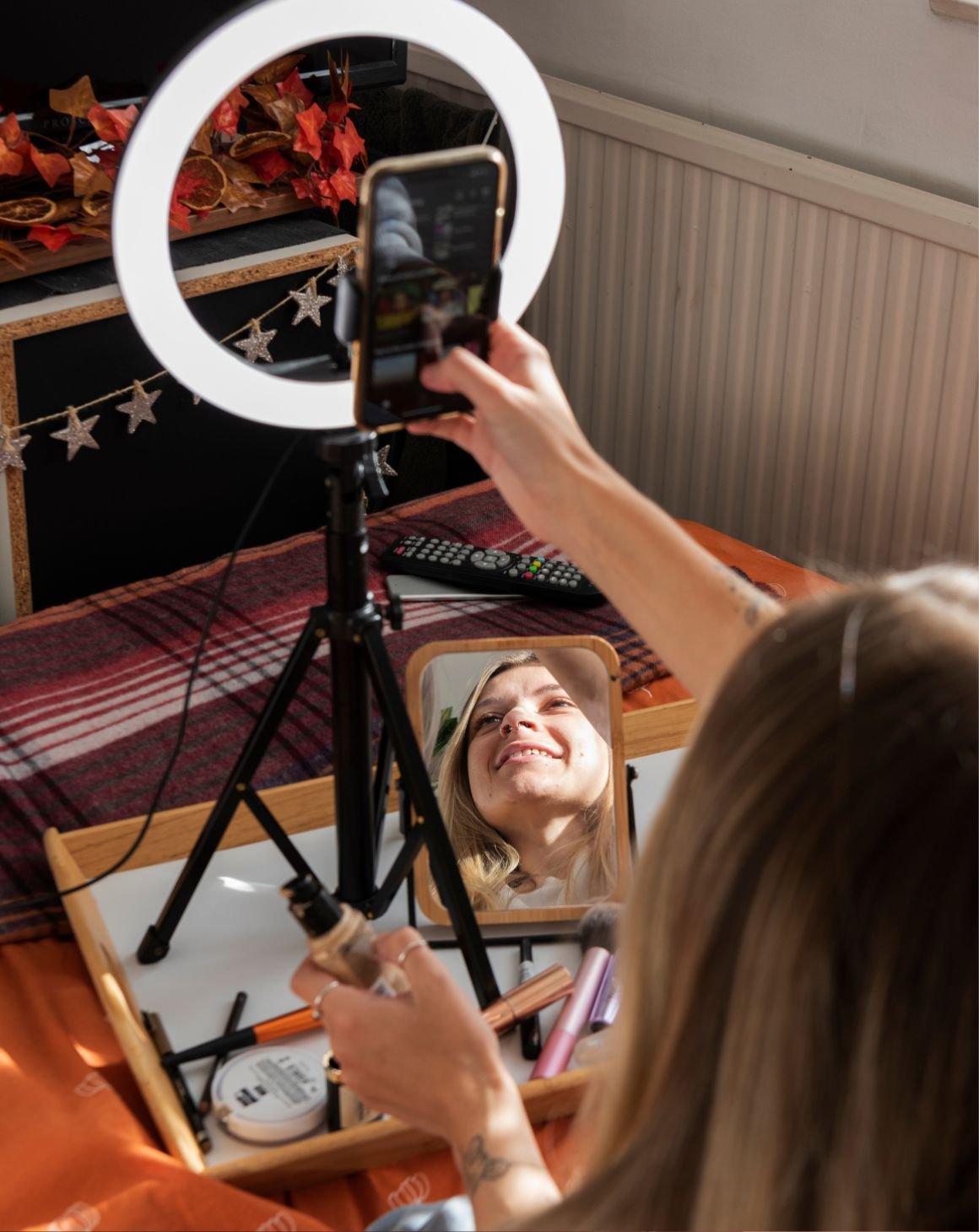 woman-ring-light-recording-on-phone