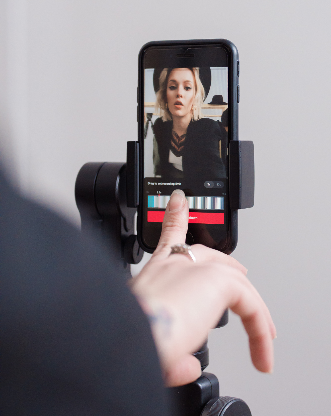 woman-recording-on-cell-phone