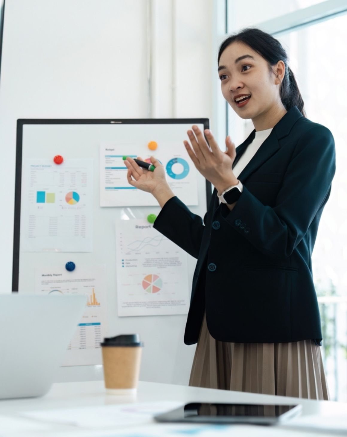 business woman presenting in a modern office
